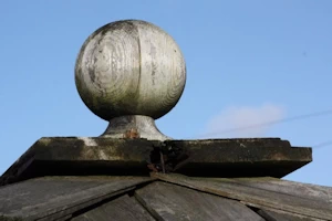 Old decayed ball finial